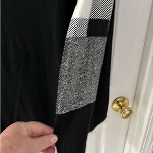 A shirt, black, white and silver silver